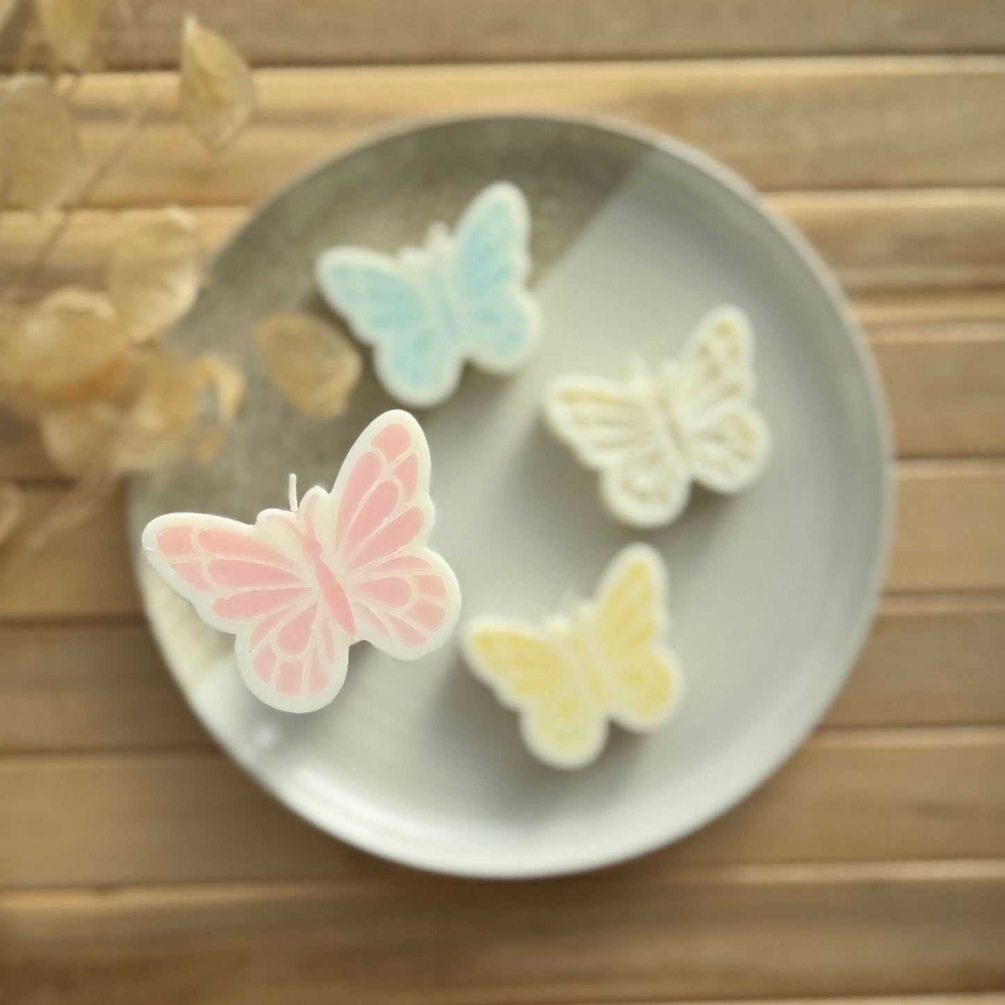 Vela decorativa mariposa
