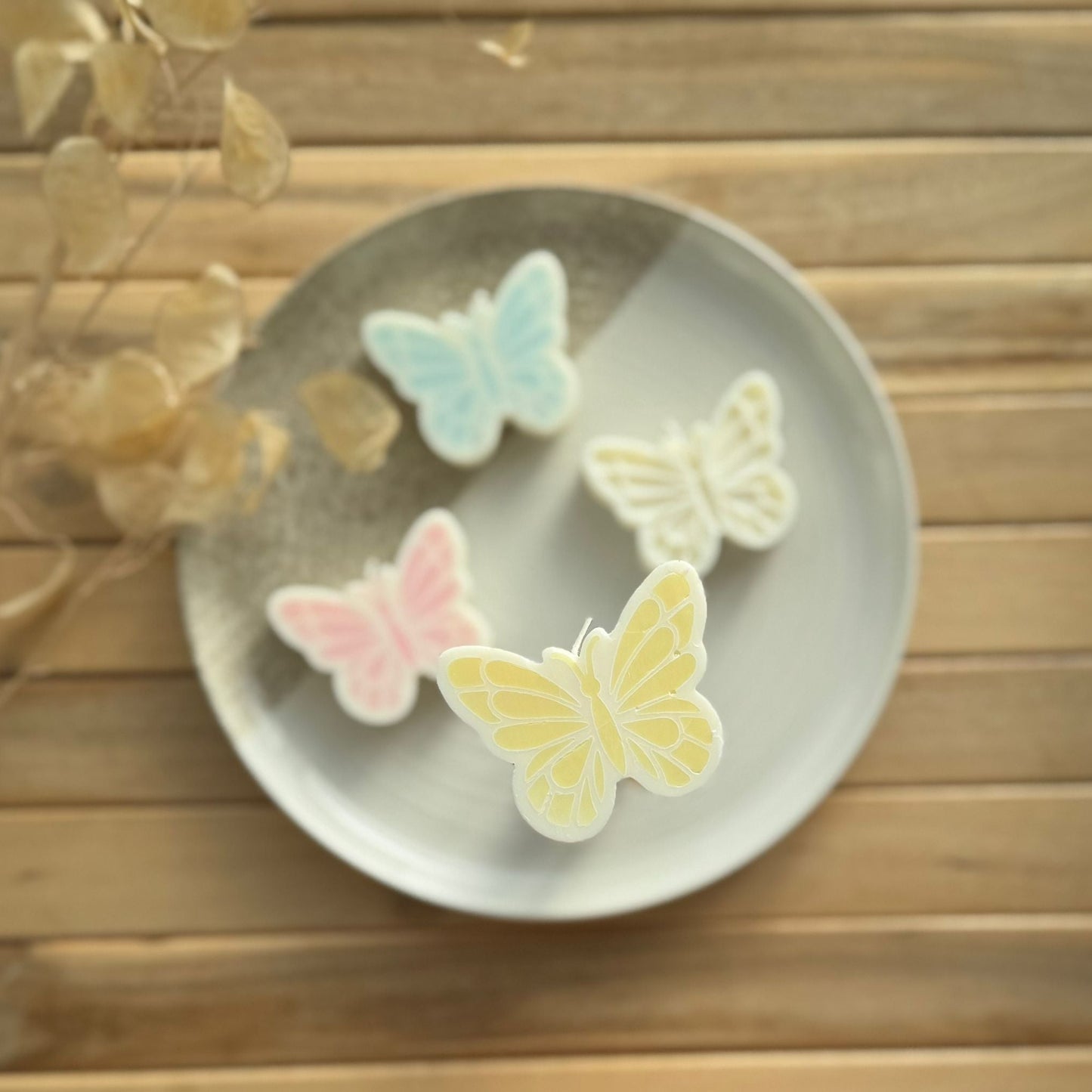 Vela decorativa mariposa