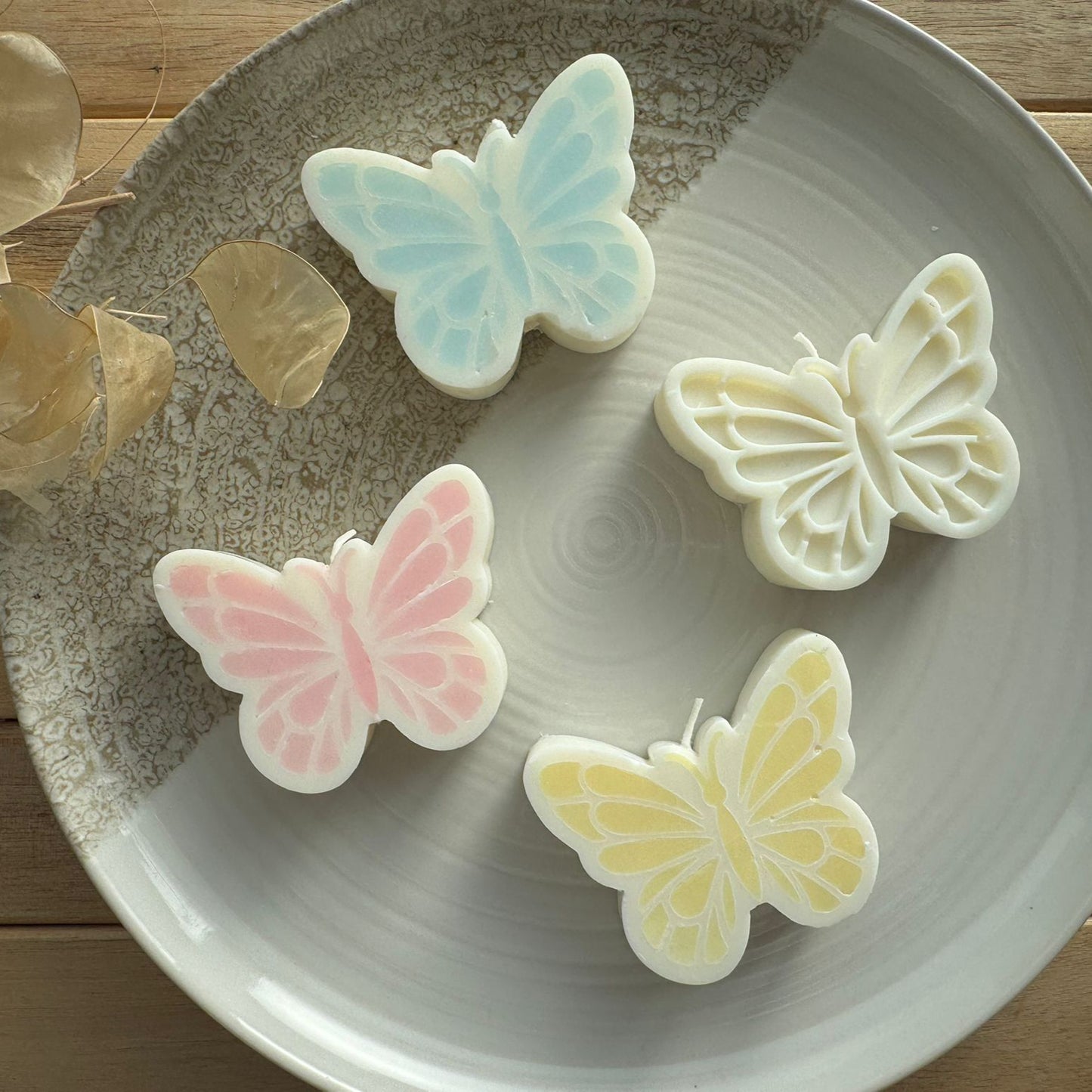 Vela decorativa mariposa